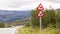 Traffic sign with reindeer and moose along the road in Scandina