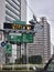Traffic signs in tokyo showing the direction to Ginza Shibuya and Haneda area