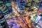 Traffic speeds through an intersection at night in Gangnam, Seoul in South Korea