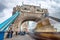 Traffic and tourists on Tower Bridge in London. Blurred long exp