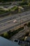 Traffic view with the cars  crossing the bridge in Toronto, aerial, vertical