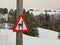 Traffic warning sign on an alpaca farm in the subalpine and tourist resort of Amden on the slopes of the Mattstogg mountain range