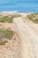 Trail, Cliffs, beach, mountains and vegetation in Canal beach