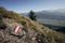 Trail marker in the Austrian alps with the Inntal valley visible in the distance