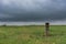 Trail Marker Sign Along Trail Cutting Across Prairie