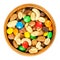 Trail mix in wooden bowl over white