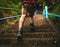 This trail is no challenge for him. Rearview shot of a man climbing stairs while hiking in the mountains.