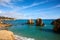 Trail over the hills of Arrifes beach in Algarve, Portugal