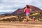 Trail runner athlete woman running training cardio on rocky mountain path on long distance endurance run in summer