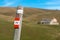 Trail Sign on a Wooden Pole - Italian Alps