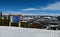 Trail signs and winter panoramic view at ski resort