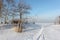 Trail from a snowmobile on the snowy island Hrenoviy, Ob Reservoir, Novosibirsk, Russia