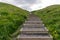 Trail of steps leading up the hill to Sugandisey Island Lighthouse in Stykkisholmur Iceland