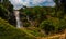 Trail to beautiful Wachirathan waterfall surrounded by lush tropical forest in Doi Inthanon National Park nera Chiang Mai