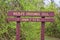 Trail and warning signs along the Shelby Bottoms Greenway and Natural Area Cumberland River frontage trails, Music City Nashville,