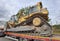 Trailer truck Earth mover backhoe on heavy duty flatbed vehicle for transported