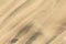 Trails of dust and shifting sand dunes textures