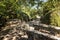 Trails and stairs through granite boulders on Penha Mountain, Portugal