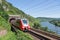 Train along river Moselle in Germany