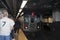 Train approaching station at underground Manhattan subway platform