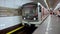 A train arrives at a platform at the Little, Bridge Mustek station on the Prague Metro