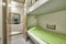 Train berth corridor indoor with two beds. Travel background.