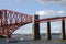 Train and boats with Forth Rail Bridge, Scotland.