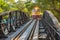 Train on the bridge over the river Kwai