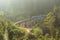 Train crosses Demodara nine arch bridge. Sri Lanka