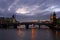 Train crossing bridge over the Thames