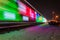 Train Decorated with Holiday Lights Arrives at Station