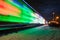 Train Decorated with Holiday Lights Arrives at Station