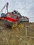 The train derailed and ran off the embankment. The crew is repairing a derailed train