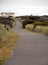 Train in dunes towards condominium near Westport lighthouse