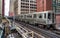 Train on elevated tracks within buildings at the Loop, Chicago City Center - Chicago, Illinois