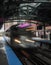 Train on elevated tracks within buildings at the Loop, Chicago City Center - Long Exposure Artistic Effect - Chicago, Illinois