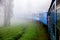 The train in the fog in the mountains of Sri Lanka. Surroundings Nuwara Eliya.