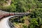 Train journey winding through the rainforest jungle to Kuranda Queensland Australia with motion blur