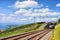 Train in Lavaux Vineyard Terraces near Lake Geneva Swiss Alps