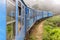 Train from Nuwara Eliya to Kandy among tea plantations in the highlands of Sri Lanka