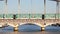 Train of Parisian subway (line 5) passing on Austerlitz viaduct over the river Seine in Paris