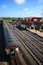 Train parking on station see railway track line , platform, with blue sky background, station roof , train roof