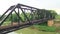 Train pratt truss steel bridge over Pasak river Thailand