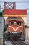 Train running on ancient railway on Long Bien bridge in Hanoi