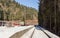 Train. Rusty. Snow. Station. Winter. Forest. Hills