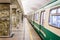 Train standing at station platform with doors closed in St Petersburg Metro in St Petersburg, Russia