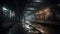 a train station at night with a train on the tracks and a person standing on the platform at the end of the train tracks in the