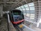 A train stops at Tedako Uranishi Station, a new Yui Rail station in Okinawa.