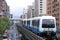 The Train of Taipei Metro Run on The Elevated Rail Through The City.