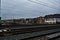 Train tracks with cables and historical houses in Amersfoort